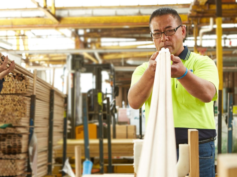 porta-mouldings staff at work handling timber