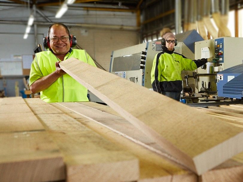 porta-mouldings staff at work handling timber